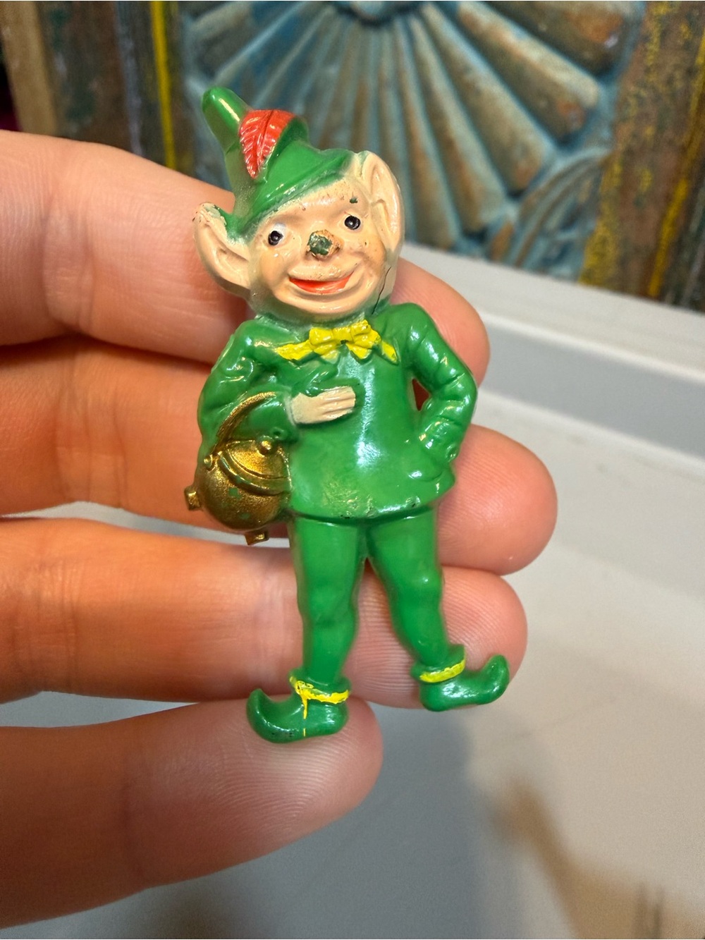 Vintage celluloid leprechaun pin